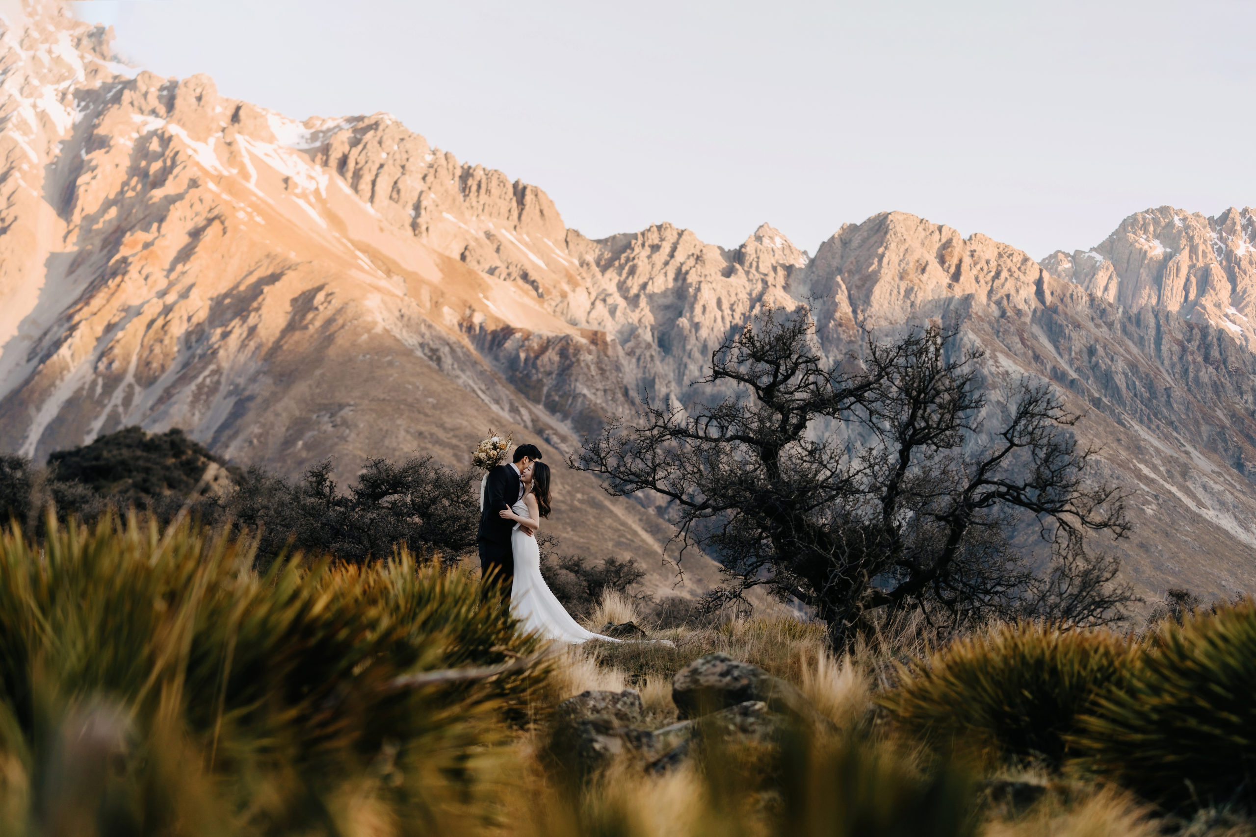 A couple in Mount Cook National Park post elopement, Tasman Glacier Couple Photoshoot