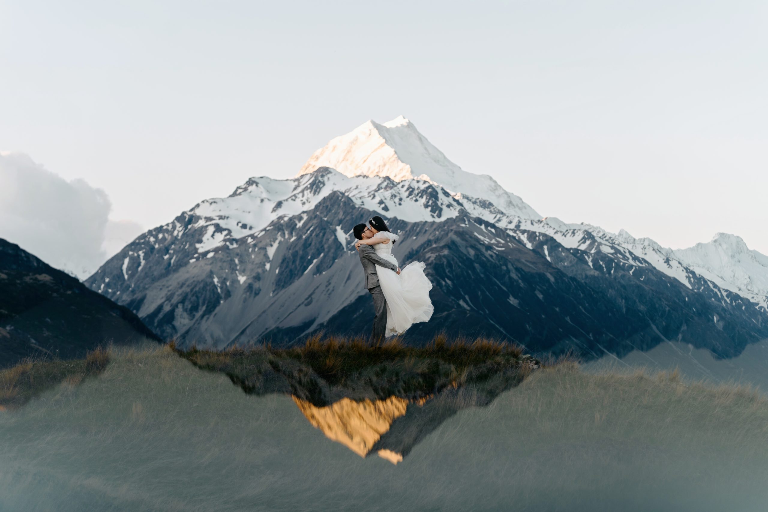 Mount Cook at sunset with the couple in the foreground