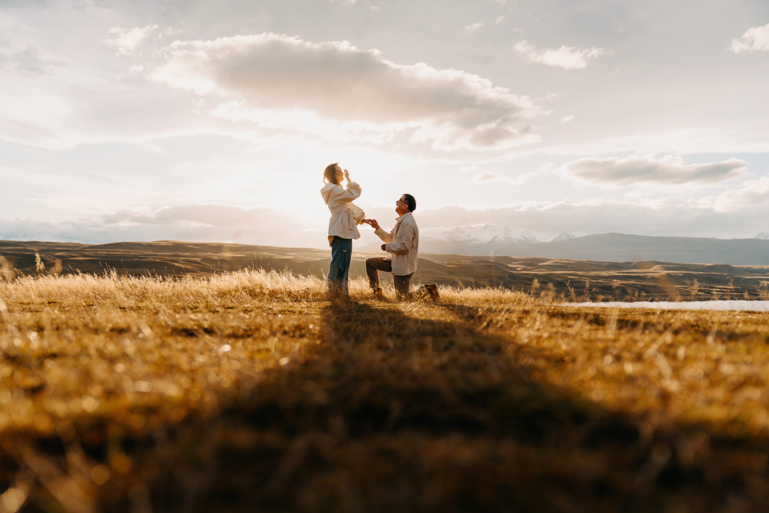 Surprise Proposal during sunset at Tekapo, New Zealand photographed by Tinted Photography