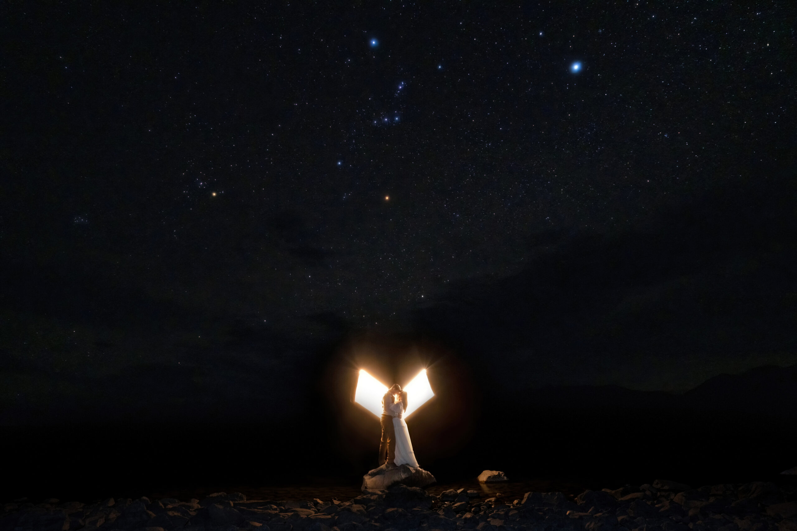 Photo of a couple with stars at Lake Tekapo