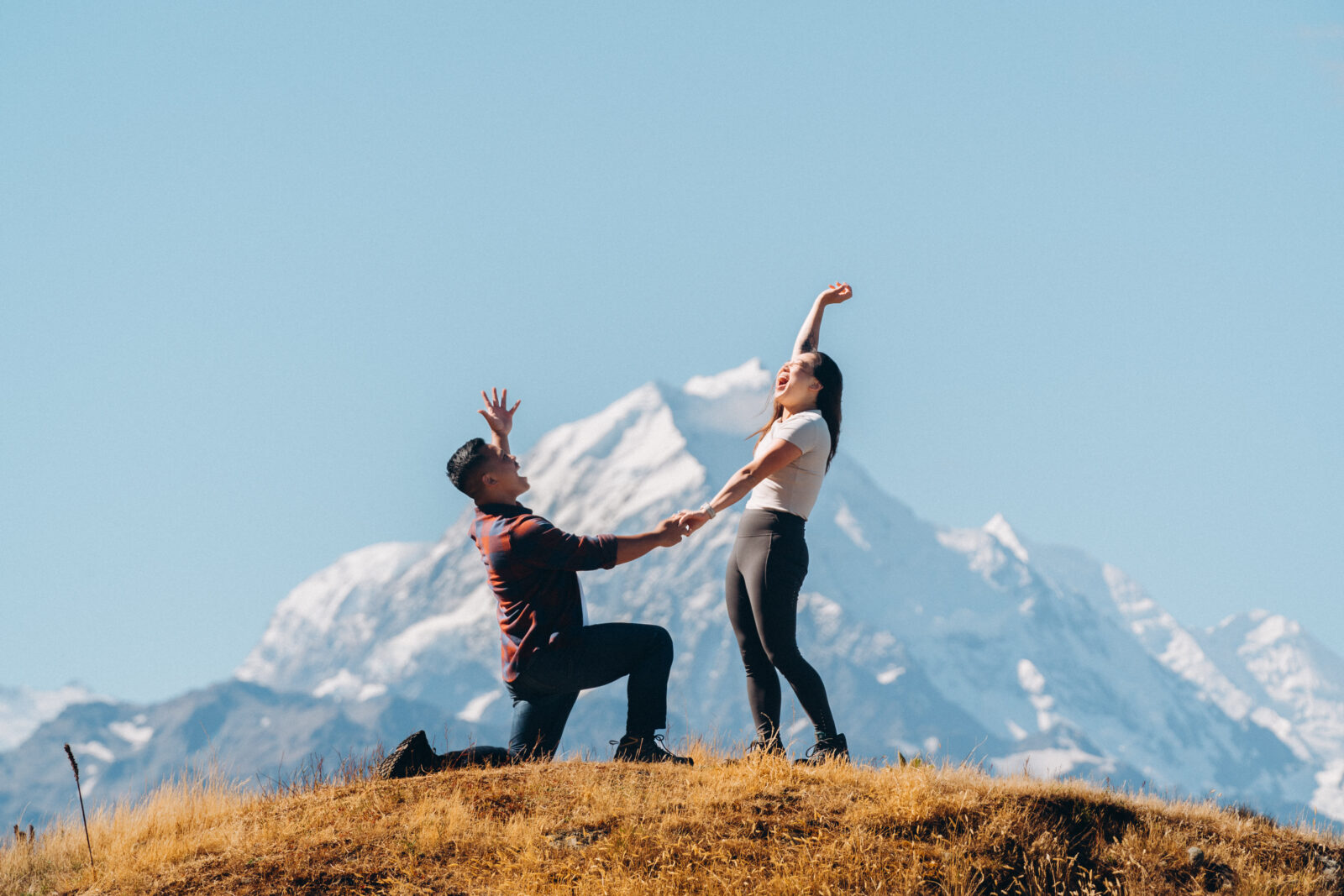 A windy surprise proposal in Tekapo - Tinted Photography