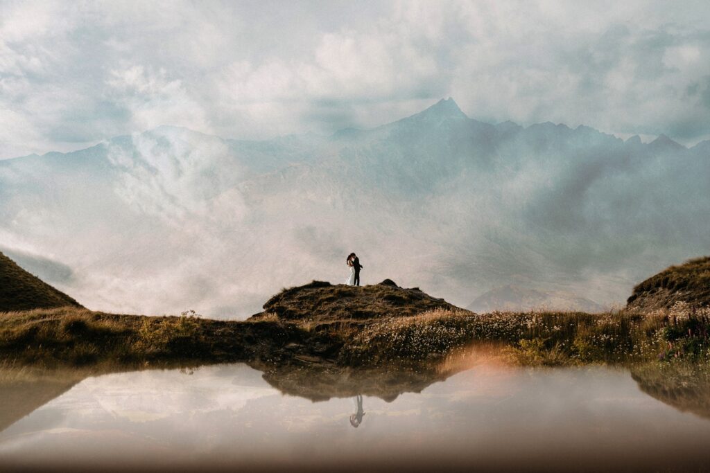 couple embrace during adventure elopment