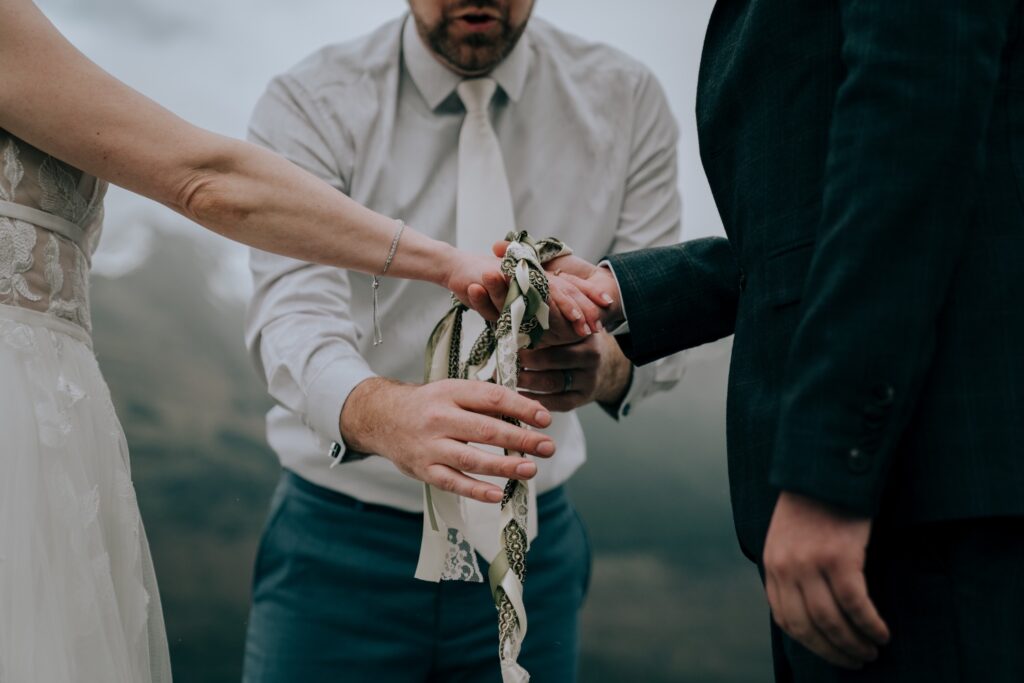 A hand-fasting ceremony at an elopement in New Zealand