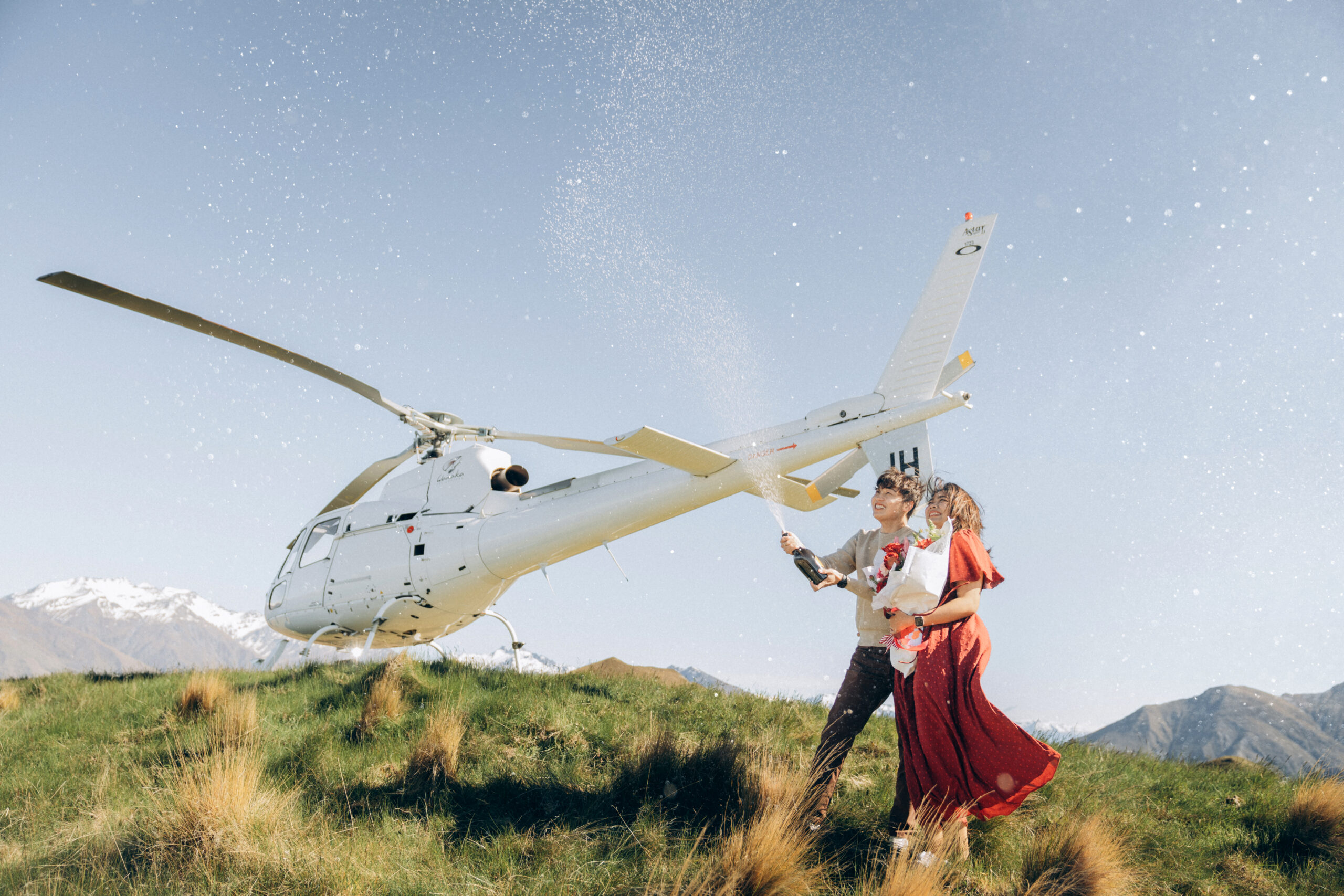 celebrations after a Heli surprise proposal in Wanaka