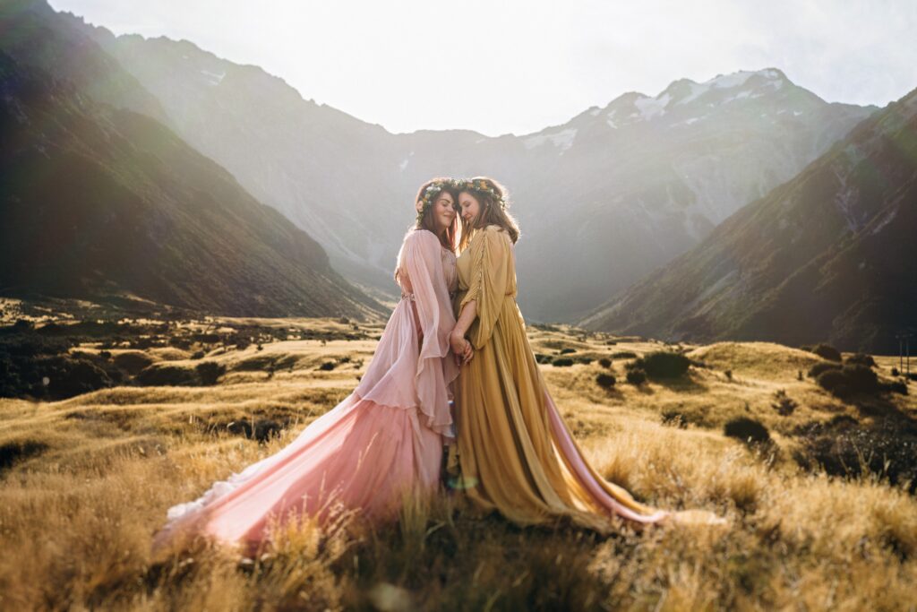 Brides embracing after their elopement in Mount Cook National Park