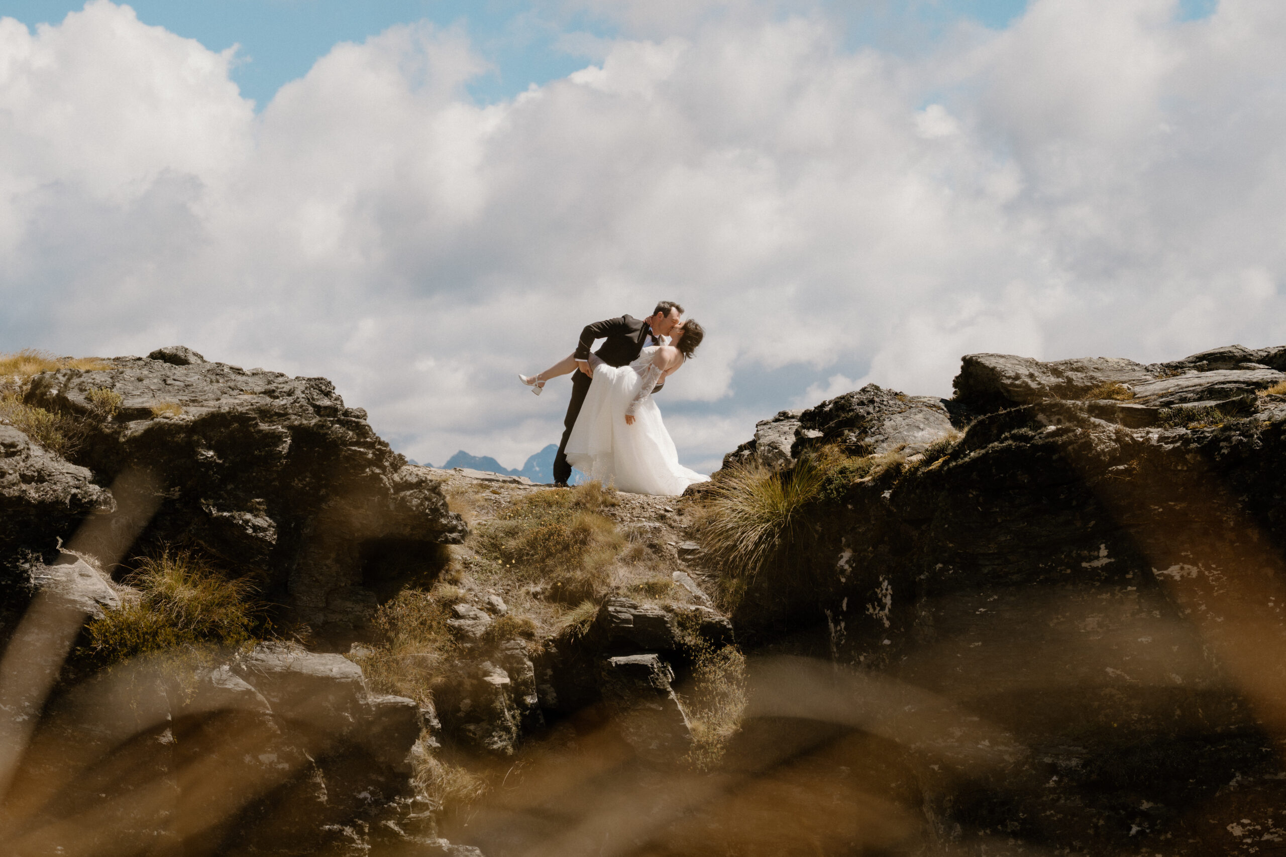 Bride and Groom on Cecil Peak before their wedding at the Winehouse, Gibbston, Queenstown